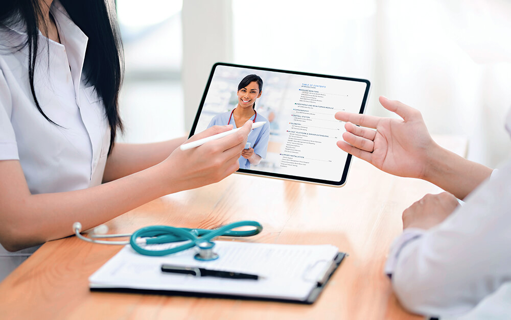A doctor and patient going over a digital brochure